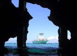 Dive boat shot from inside the wreck of the Saponna, Bimini by Don Bruschera 